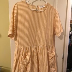 Yellow and white striped babydoll mini dress
